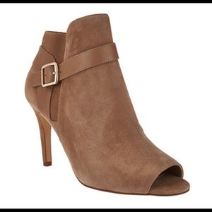 Light tan suede high heel booties.